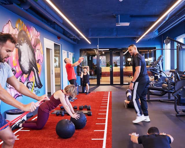 People working out in the gym.