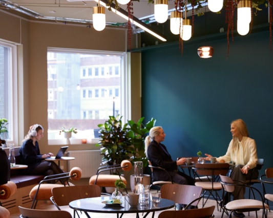 People sitting in a dining area.