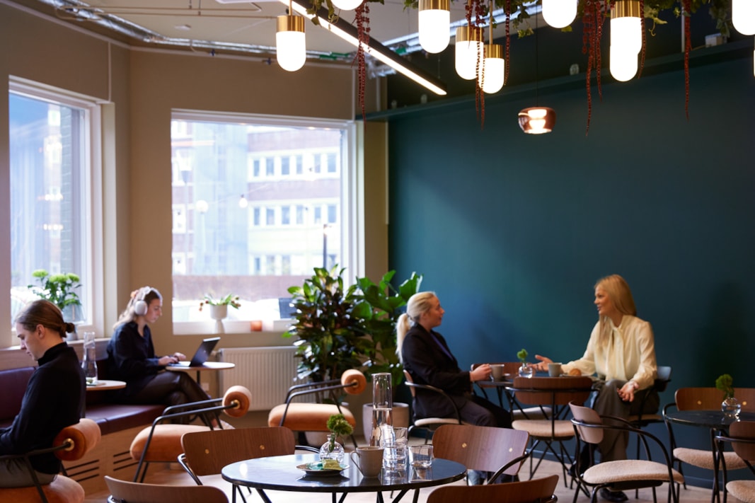 People sitting in a dining area.