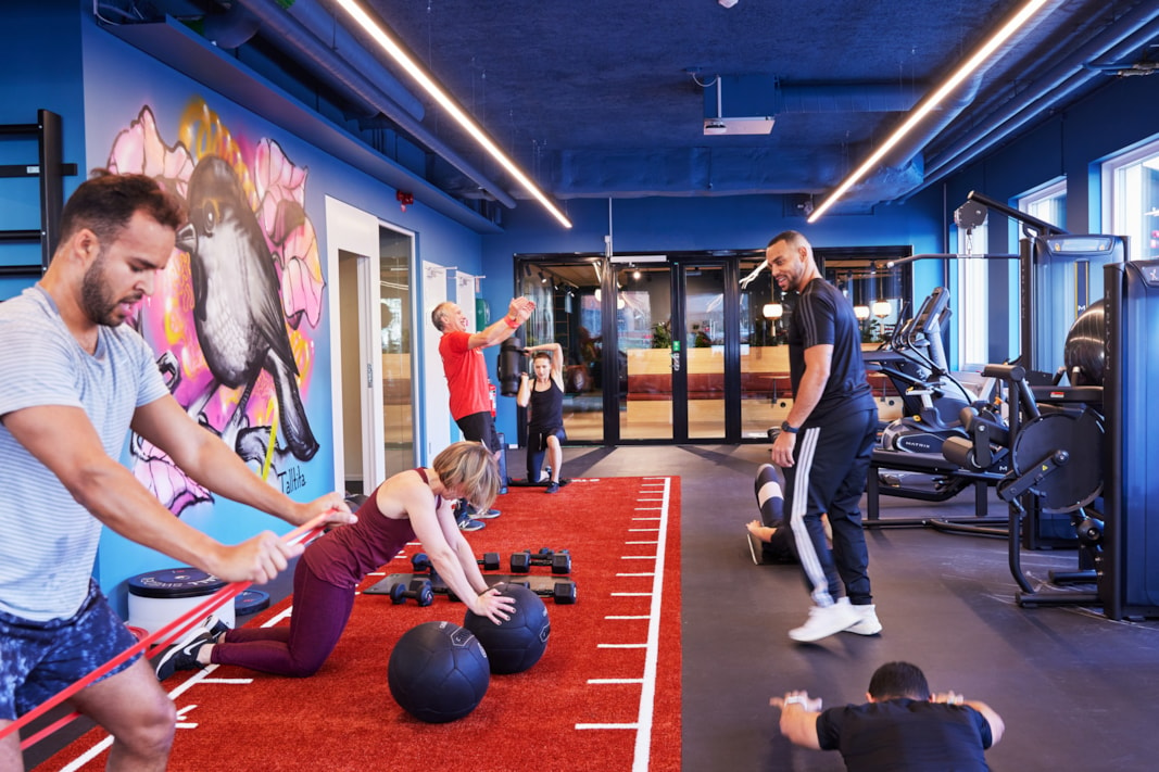 People working out in the gym.