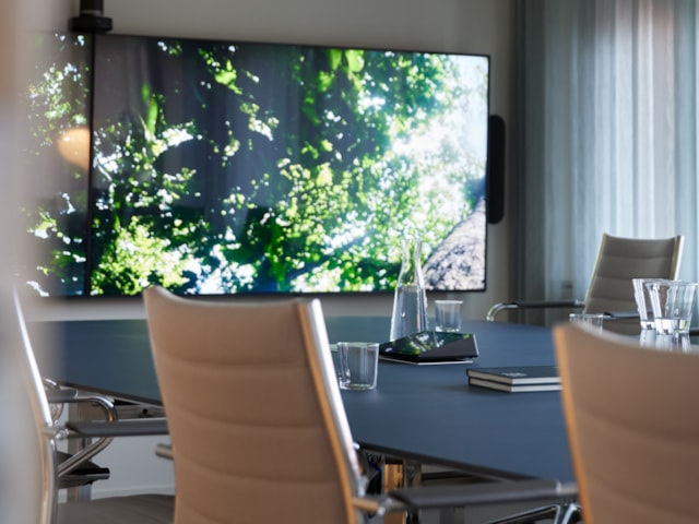 Conference room with a screen.